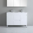White bathroom vanity with two sinks against a gray wall.