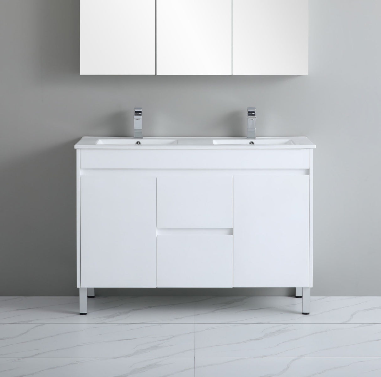 White bathroom vanity with two sinks against a gray wall.