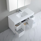 White bathroom vanity with sink and mirror on a marble floor