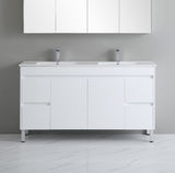 White bathroom vanity with two sinks against a gray wall.