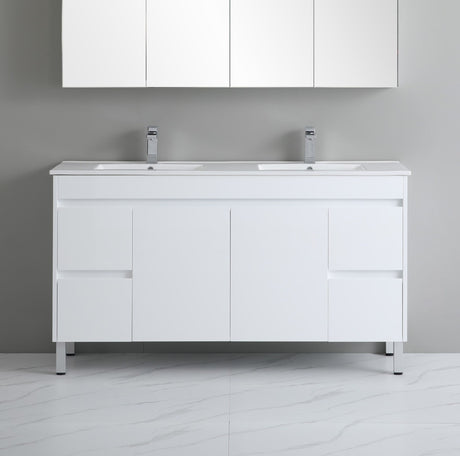 White bathroom vanity with two sinks against a gray wall.
