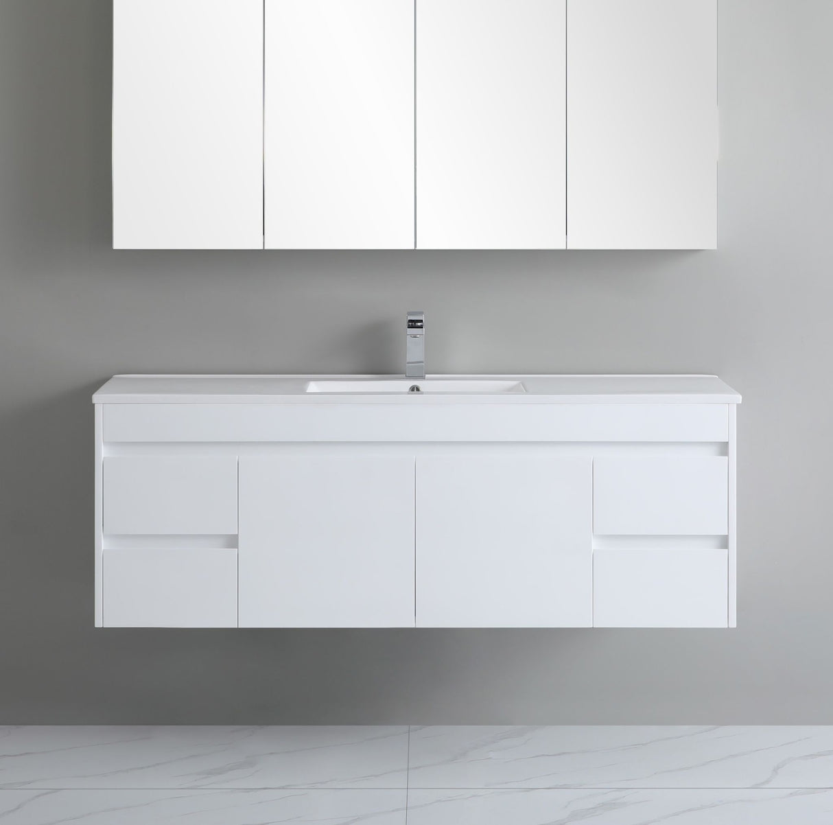 White bathroom vanity with sink and cabinets against a gray wall.