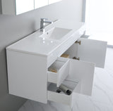 White bathroom vanity with open cabinet doors in a bright room.