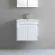 White bathroom vanity with sink against a gray wall