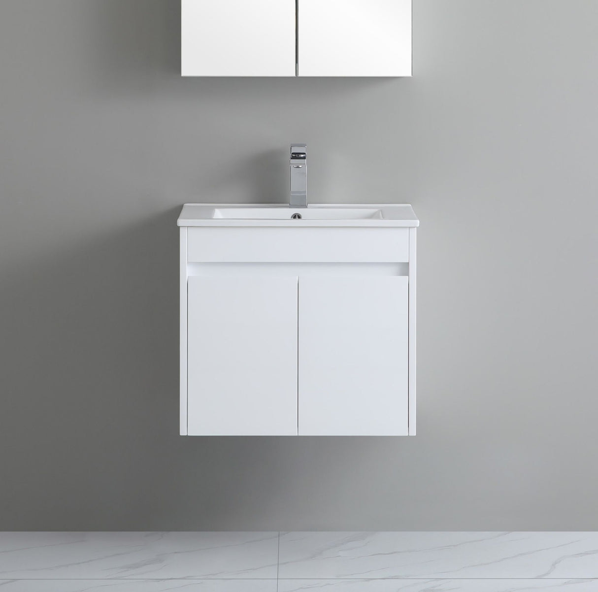 White bathroom vanity with sink against a gray wall