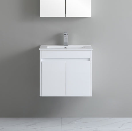 White bathroom vanity with sink against a gray wall