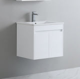 White wall-mounted vanity with sink against a gray wall