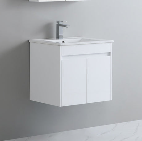 White wall-mounted vanity with sink against a gray wall