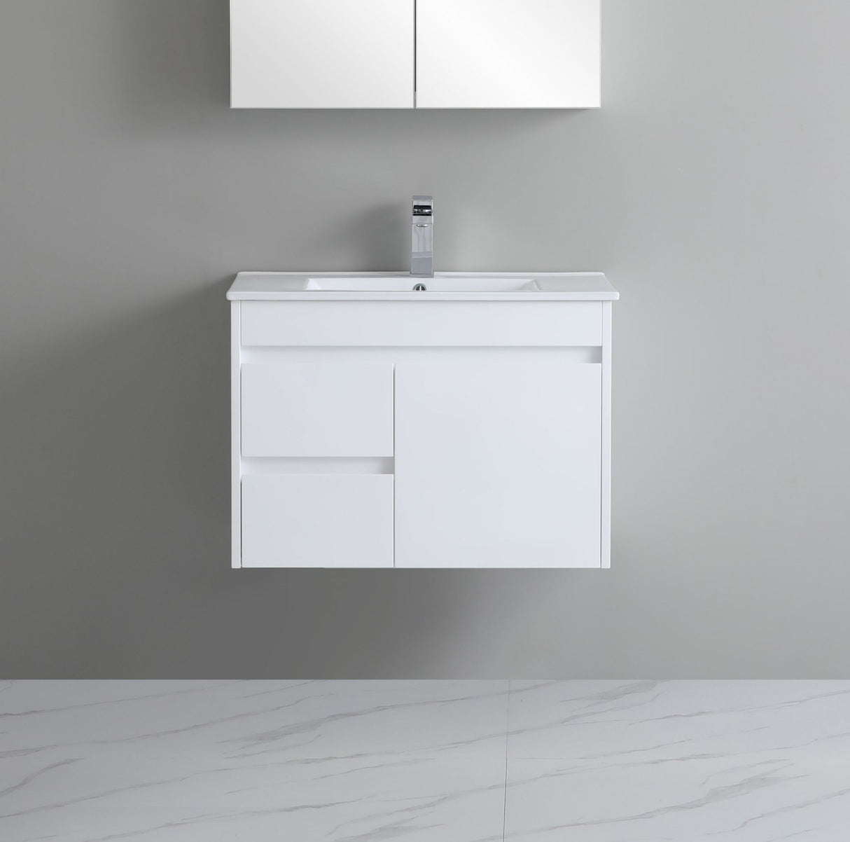White bathroom vanity with sink against a gray wall