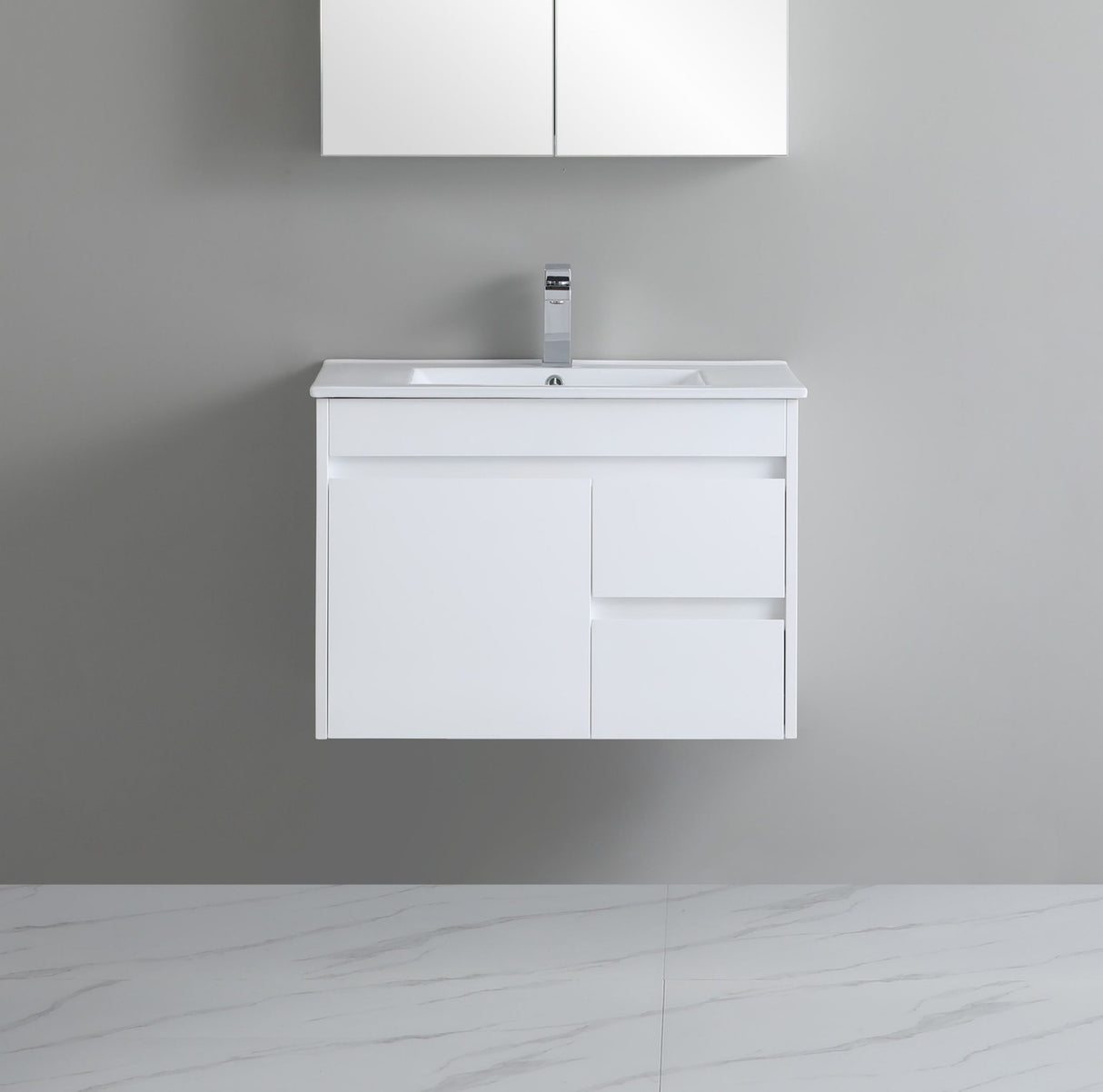 White bathroom vanity with sink against a gray wall