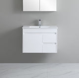 White bathroom vanity with sink against a gray wall