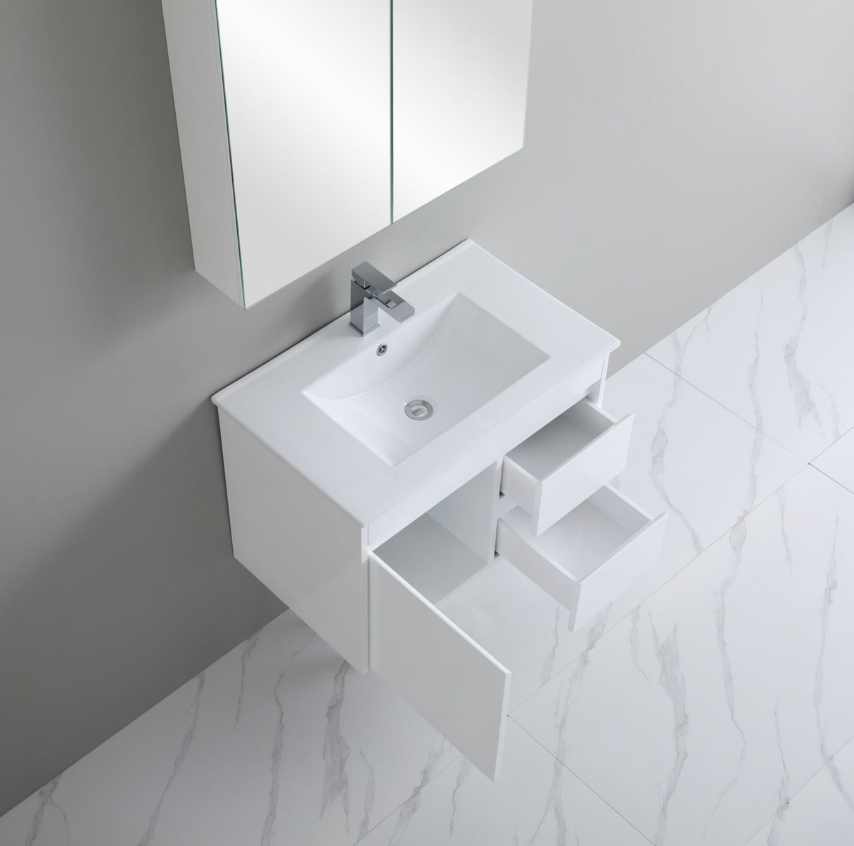 White bathroom vanity with sink and mirror in a modern setting