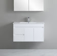 White bathroom vanity with sink against a gray wall