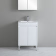 White bathroom vanity with sink against a gray wall