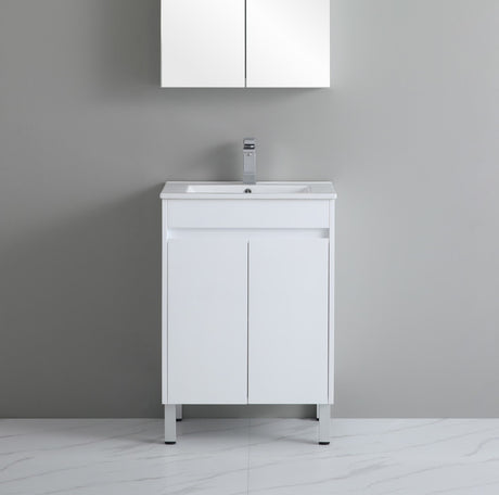 White bathroom vanity with sink against a gray wall