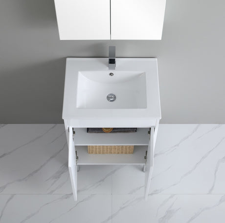 White bathroom vanity with sink against a gray wall