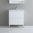 White bathroom vanity with sink against a gray wall