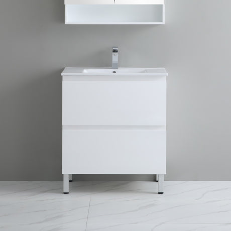 White bathroom vanity with sink against a gray wall