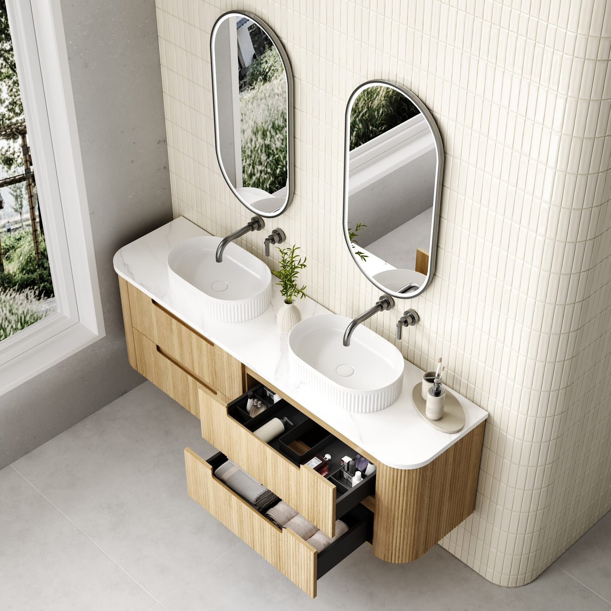 Bathroom vanity with double sink, mirrors, and open drawer.