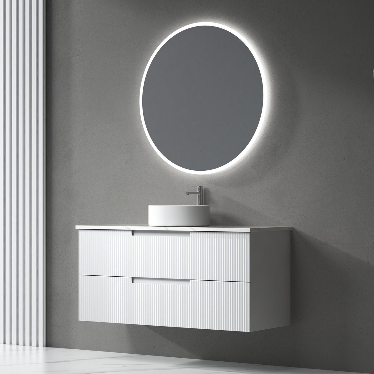 Bathroom vanity with round illuminated mirror on a gray wall