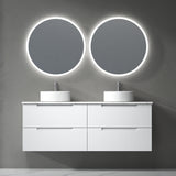 Bathroom vanity with two round illuminated mirrors on a gray wall.