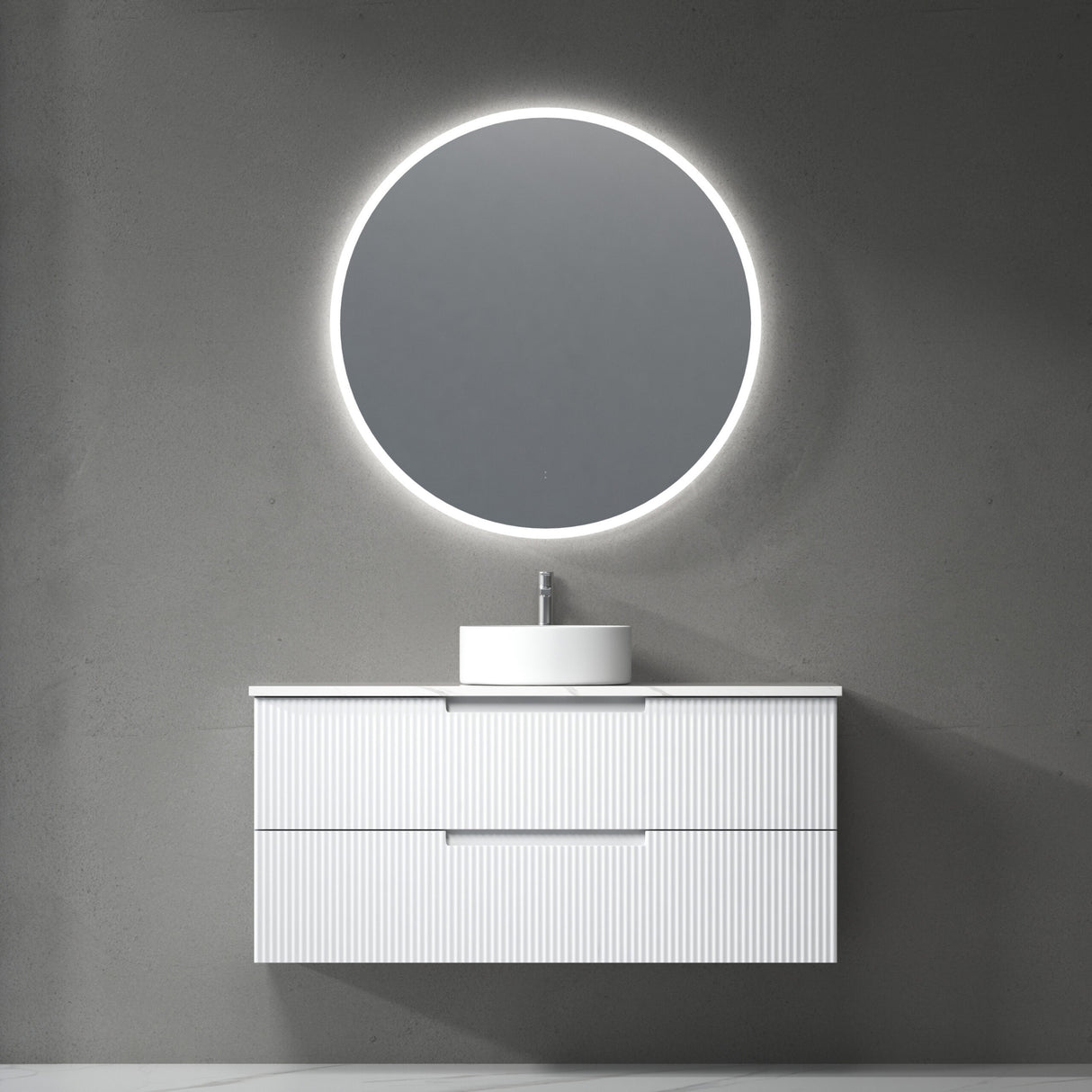Bathroom vanity with round illuminated mirror on a gray wall