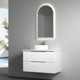 Bathroom vanity with sink and mirror in a modern setting