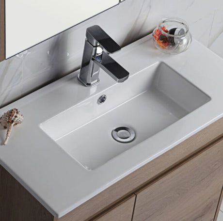 Bathroom sink with faucet on a white countertop