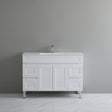 White bathroom vanity with sink against a gray wall