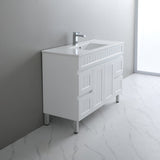 White bathroom vanity with sink against a gray wall