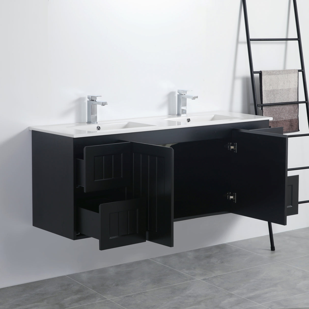 Bathroom vanity with open cabinet doors on a white wall.
