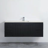 Black bathroom vanity with white countertop against a white wall