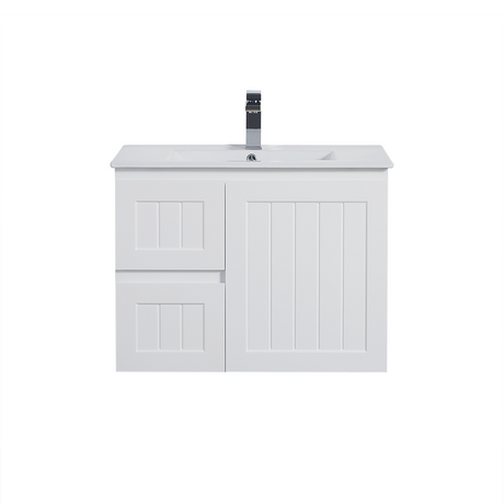 White bathroom vanity with sink and faucet on a white background