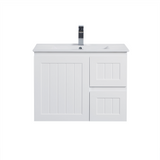 White bathroom vanity with sink and faucet on a white background