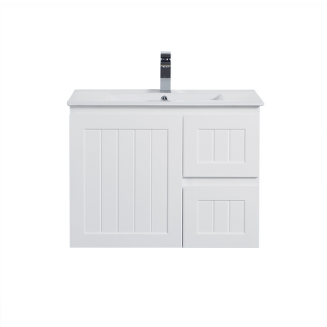 White bathroom vanity with sink and faucet on a white background