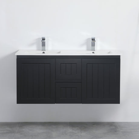 Black double sink vanity unit against a white wall.