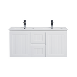 White bathroom vanity with double sink and two faucets on a white background