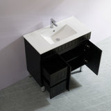 Bathroom vanity with white sink and open black cabinet door.
