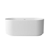 White freestanding bathtub with ribbed texture on a white background