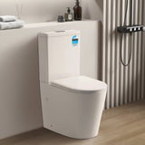 Modern toilet in a bathroom setting with a neutral color scheme.
