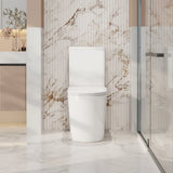Modern toilet in a stylish bathroom with marble walls and a glass shower enclosure.