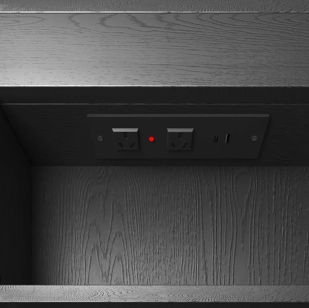 Wooden cabinet with electrical outlets and a red light indicator.