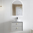 Bathroom vanity with sink and mirror in a modern setting