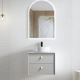 Bathroom vanity with sink and mirror in a modern setting