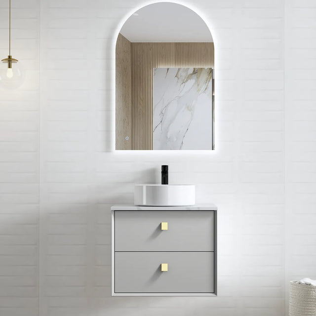 Bathroom vanity with sink and mirror in a modern setting