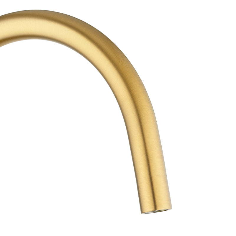 Brushed Brass curved faucet handle on a white background