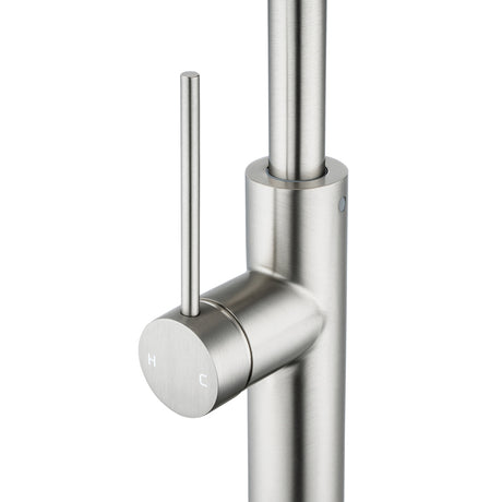 Brushed nickel kitchen faucet on a white background