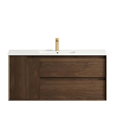 Bathroom vanity with wooden cabinet, white countertop, and gold faucet on a white background