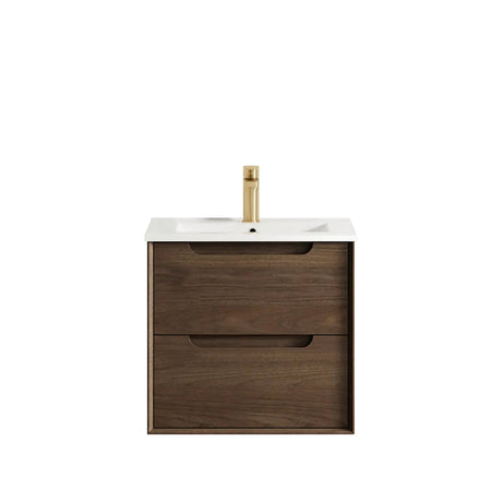 Bathroom vanity with wooden cabinet, white countertop, and gold faucet on a white background