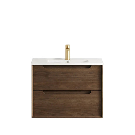 Bathroom vanity with wooden cabinet, white countertop, and gold faucet on a white background